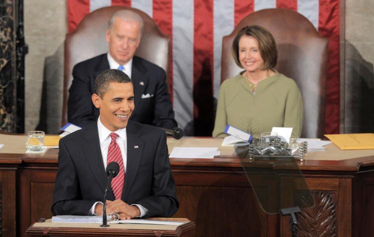 President Barack Obama addresses a joint session of Congress as Vice President Joe Biden and House Speaker Nancy Pelosi look on at the Capitol in Washington on Feb. 24, 2009. (Saul Loeb/AFP/Getty Images)