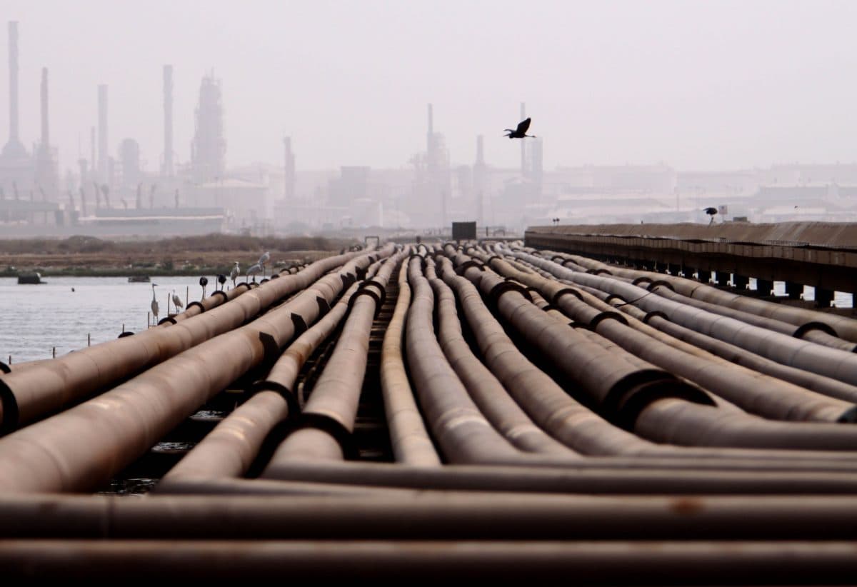 Oil pipelines on a hot, humid day near a refinery in Sitra, Bahrain, in the Persian Gulf, on Aug. 19, 2009. (Hasan Jamali/AP Photo)