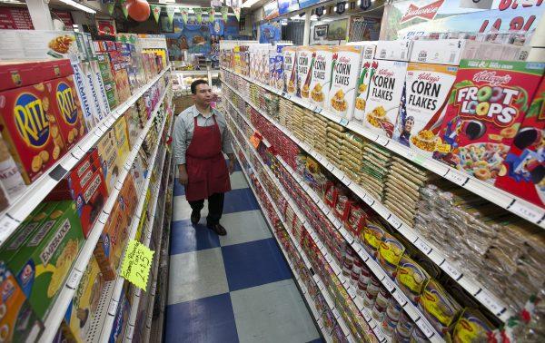 Owner Ray Martinez at La Playa Market in Inglewood, Calif., on Nov. 1, 2012. Food producers in the state will no longer stamp a “sell by” date on food after July 1, 2027. (AP Photo/Damian Dovarganes)