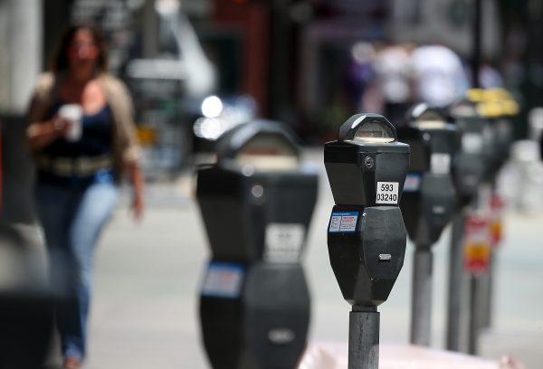 A row of parking meters line O'Farrell Street in San Francisco, Calif., on July 3, 2013. (Justin Sullivan/Getty Images)