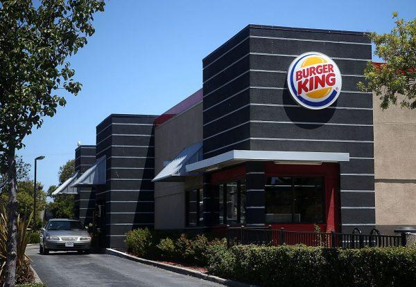 A car sits in the drive-thru at a Burger King restaurant in San Rafael, Calif., on July 27, 2015. (Justin Sullivan/Getty Images)