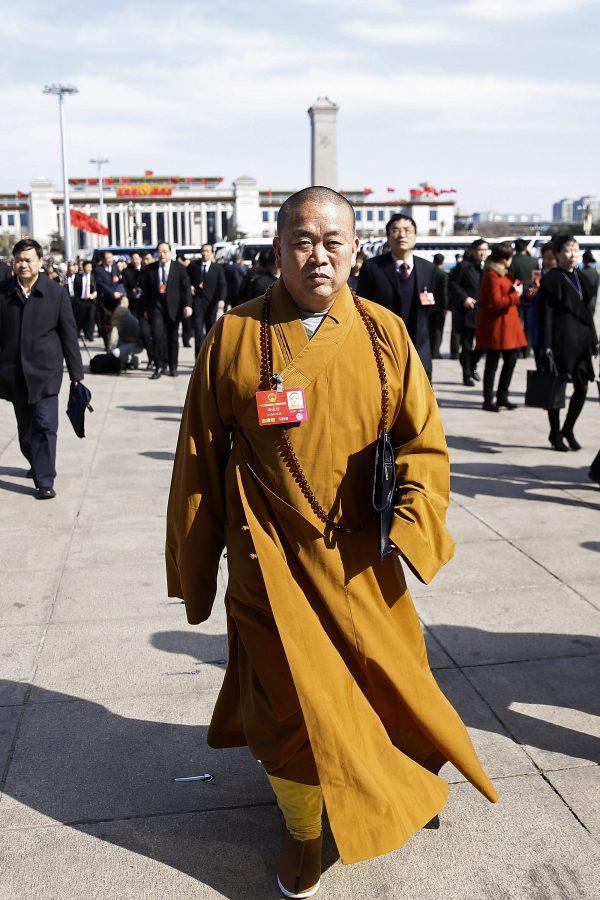 Shi Yongxin, abbot of Shaolin Temple, arrives for a session of the National People's Congress in Beijing, on March 9, 2016. (Lintao Zhang/Getty Images)