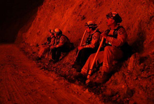 Firefighters monitor a back fire as they battle the Mendocino Complex fire near Lodoga, Calif. on Aug. 7, 2018 (Justin Sullivan/Getty Images)