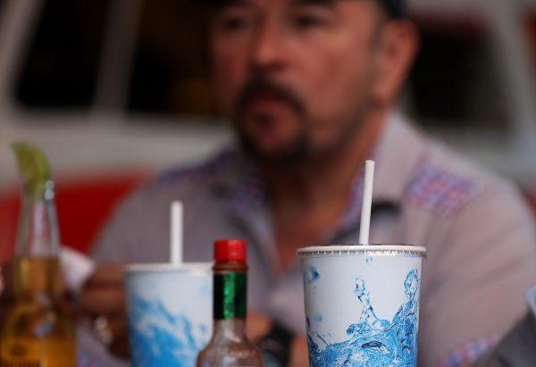 Paper straws sit in soft drinks at Wipeout Bar & Grill on June 21, 2018, in San Francisco, Calif. (Photo by Justin Sullivan/Getty Images)