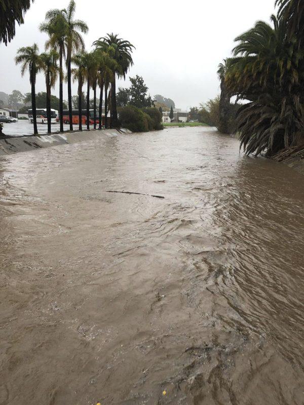 photo released by Santa Barbara County Fire, the San Pedro Creek flows under Hollister Ave. near Fairview Ave. in Goleta, Calif., on Feb. 2, 2019. (Mike Eliason/Santa Barbara County Fire via AP)