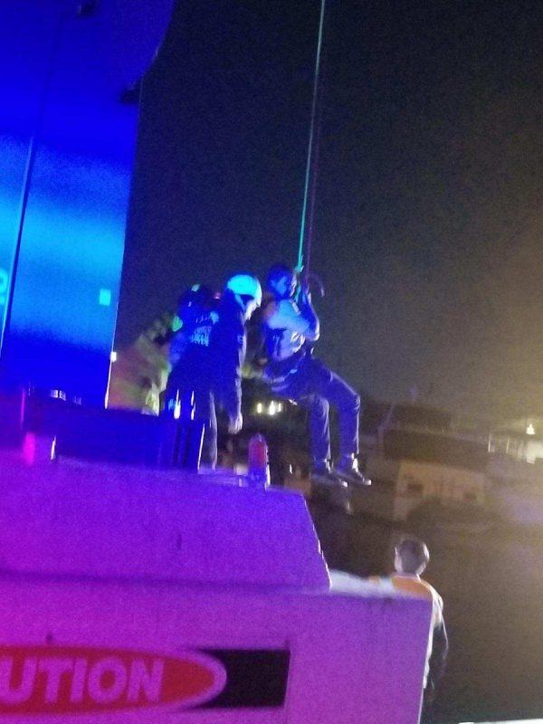 Rescue crews lower a passenger to safety from the Bayside Skyride in San Diego on Feb. 18, 2019. (SDFD)