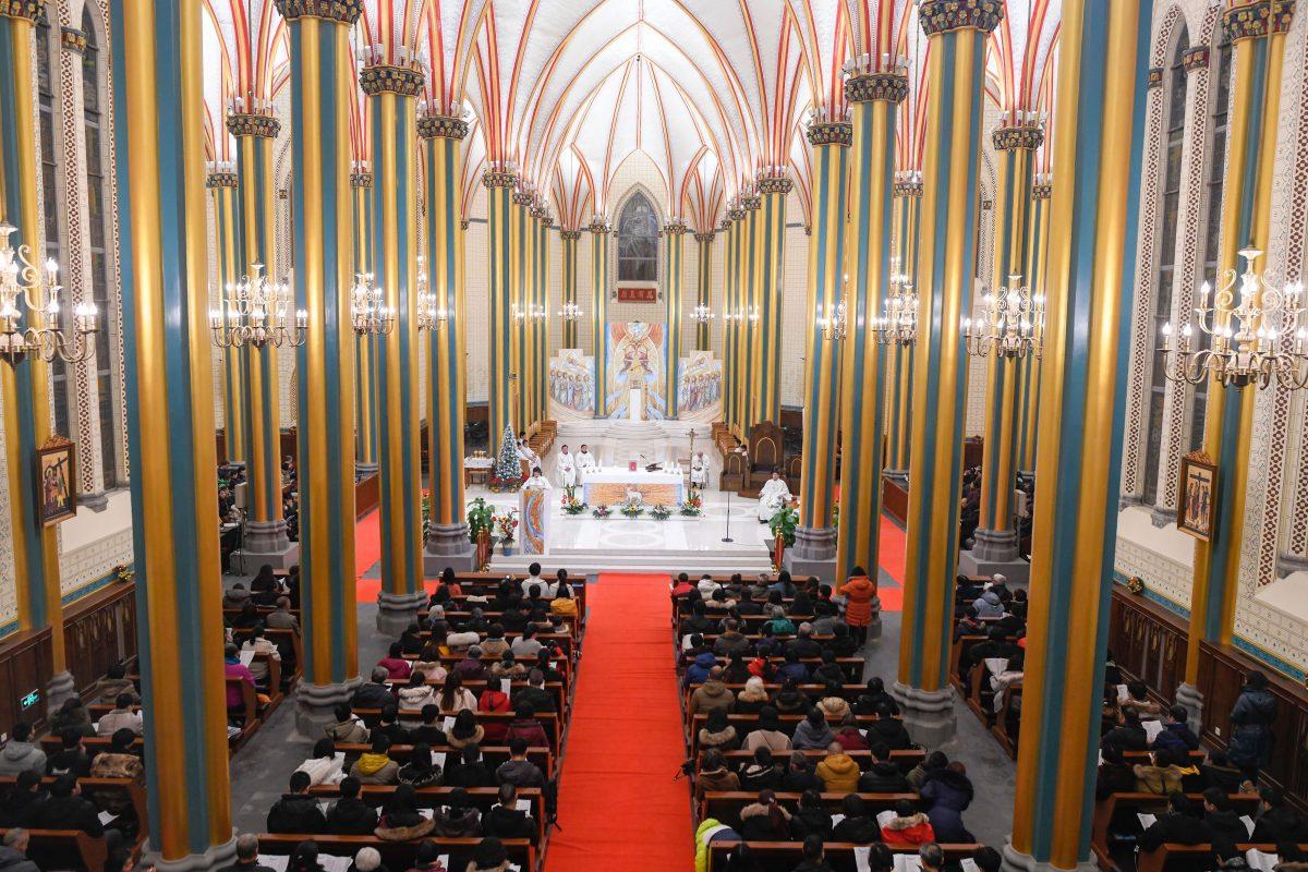 Chinese worshippers attend a mass during Christmas Eve at a Catholic church in Beijing on Dec. 24, 2018. (Wang Zhao/AFP/Getty Images)