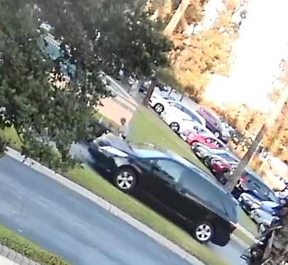 Surveillance cameras in the shopping center captured the SUV driven by the alleged abductors. (FBI)