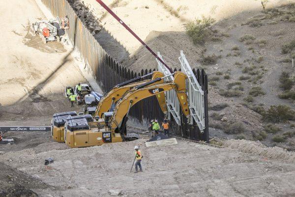 Construction continues up Mount Cristo Rey on the new half-mile section of border fence built by We Build the Wall at Sunland Park, N.M., on May 30, 2019. (Charlotte Cuthbertson/The Epoch Times)