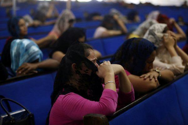 Devotees participate in a prayer vigil at the La Luz del Mundo (The Light of the World) church after its leader Naason Joaquin Garcia was arrested in California, in Guadalajara, Mexico June 5, 2019. (Fernando Carranza/Reuters)