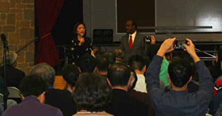 Lily Qi, then chief administrator for Montgomery County Executive Isiah Legget, in a Chinese community event hosted by the Montgomery government in 2016. (He Yi, The Epoch Times)