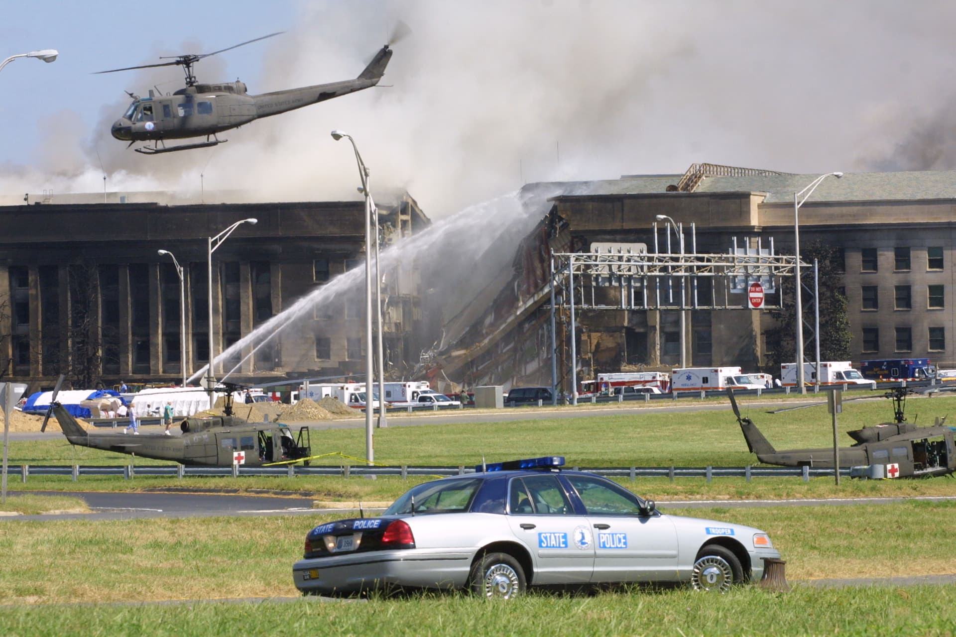 Smoke comes out from the Southwest E-ring of the Pentagon building in Arlington, Va., on Sept. 11, 2001, after a plane crashed into the building and set off a huge explosion. (Alex Wong/Getty Images)