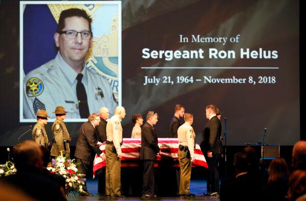 The flag-draped casket of Ventura County Sheriff Sgt. Ron Helus arrives on stage for a memorial service for Sgt. Helus at Calvary Community Church in Westlake Village, California, on Nov. 15, 2018. (Al Seib-Pool/Getty Images)