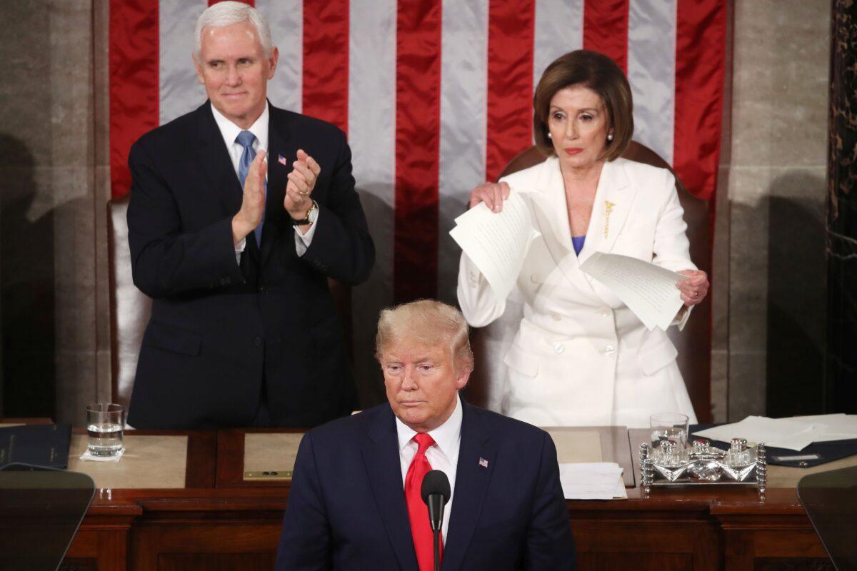 House Speaker Nancy Pelosi rips up the State of the Union speech after President Trump's address in the House of Representatives on Feb. 4, 2020. Trump delivered his third State of the Union to the nation the night before the Senate was set to vote on his impeachment. (Mark Wilson/Getty Images)