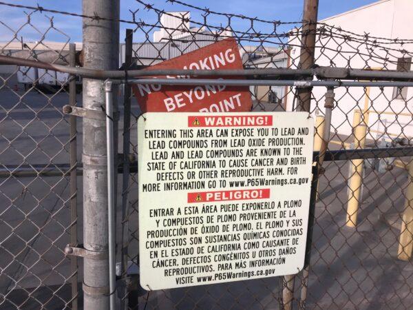 A sign outside a shuttered Exide Technologies battery recycling plant in Commerce, Calif., on Jan. 31, 2020. (Chris Karr/The Epoch Times)