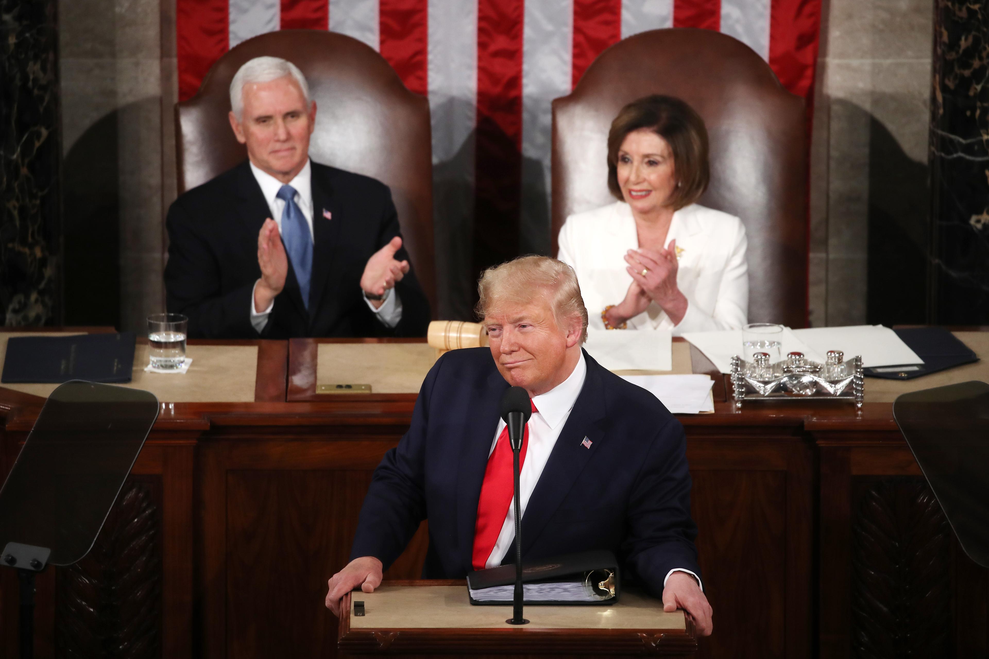 President Donald Trump delivers the State of the Union address as House Speaker Nancy Pelosi (D-Calif.) and Vice President Mike Pence look on in the chamber of the House of Representatives  on Feb. 4, 2020. (Mark Wilson/Getty Images)