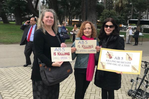 Three musicians protest California's AB5 law, which mandates businesses hire employees instead of contractors, prior to the COVID-19 pandemic. (Courtesy of Sylvia Amorino)
