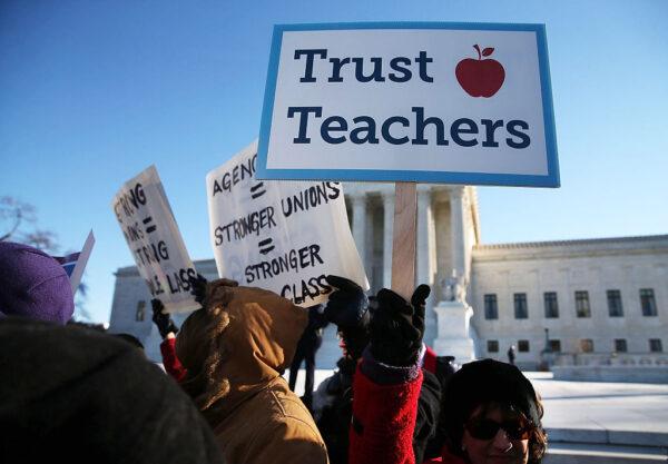 A file photo of California Teachers Association supporters demonstrating in favor of public employees having to pay union dues, in front of the U.S. Supreme Court in Washington, D.C., on Jan. 11, 2016, in Washington, DC. (Mark Wilson/Getty Images)