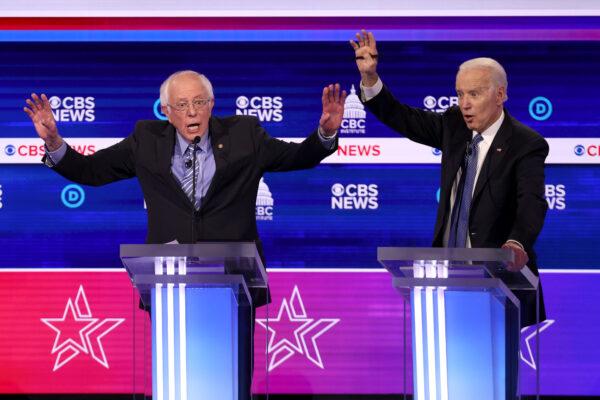 Democratic presidential candidate Sen. Bernie Sanders (I-VT) (L) speaks as former Vice President Joe Biden reacts during the Democratic presidential primary debate at the Charleston Gaillard Center on Feb. 25, 2020 in Charleston, SC. (Win McNamee/Getty Images)