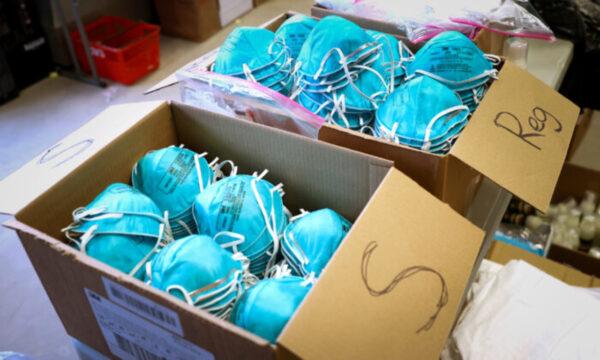 Boxes of N95 protective masks for use by medical field personnel are seen at a New York State emergency operations incident command center during the CCP virus outbreak in New Rochelle, N.Y., on March 17, 2020. (Mike Segar/Reuters)