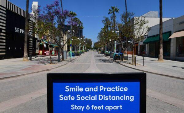 Most businesses remain closed along the Third Street Promenade shopping street in Santa Monica, Calif., on May 8, 2020. (Frederic J. Brown/AFP via Getty Images)