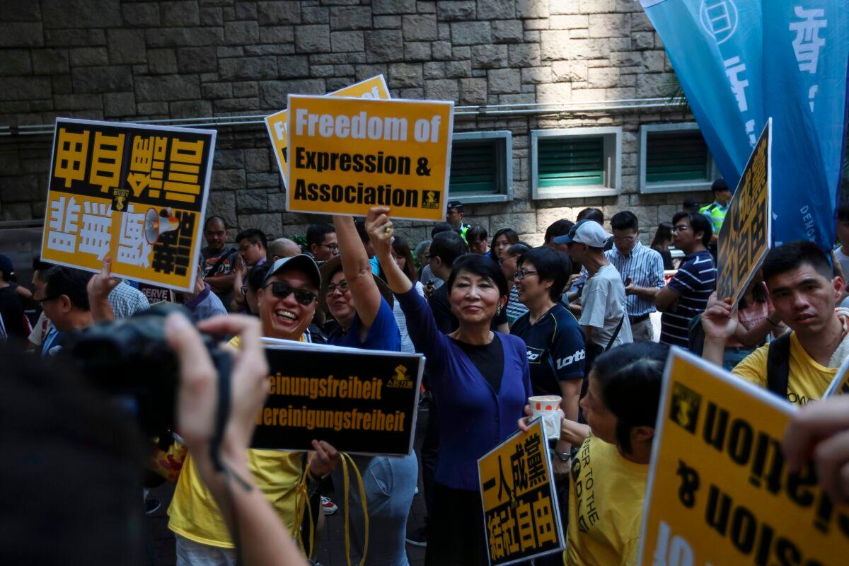 Protesters march during a demonstration against Article 23 and bans on freedom of association, in Hong Kong on July 21, 2018. (Vivek Prakash/AFP via Getty Images)