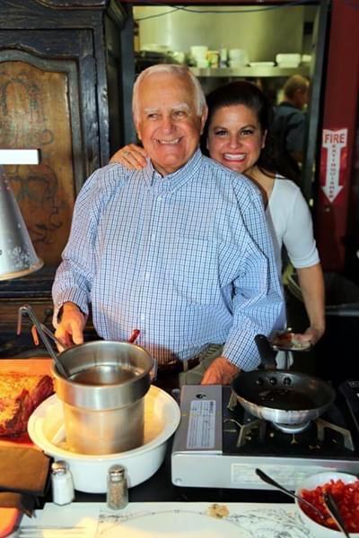 Katia Bagatta and her father cook up a meal inside Bistro K restaurant in Laguna Niguel, Calif. (Courtesy of Katia Bagatta)