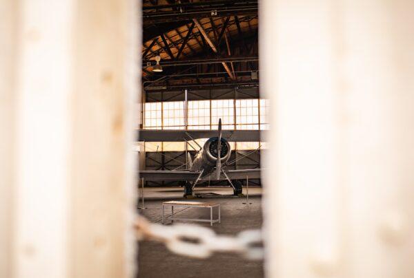 A hangar displaying a World War I-era aircraft is chained shut from visitors at Orange County Great Park in Irvine, Calif., on July 2, 2020. (John Fredricks/The Epoch Times)