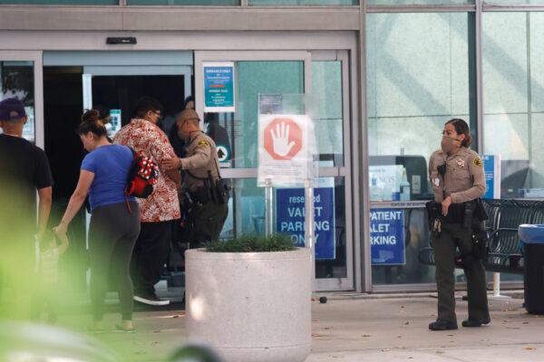 Los Angeles County Sheriffs Department deputies are seen outside St. Francis Medical Center hospital following the ambush shooting of two deputies in Compton, in Lynwood, Calif., on Sept. 13, 2020. (Patrick T. Fallon/Reuters)