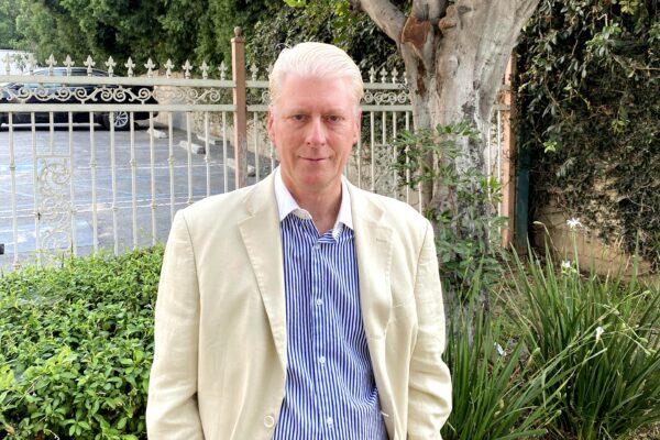 Dr. Dana Churchill, the U.S. West Coast delegate of Doctors Against Forced Organ Harvesting, attends a rally in Los Angeles to raise awareness of the persecution of Falun Gong in China, on Sept. 13, 2020. (Jack Bradley/The Epoch Times)