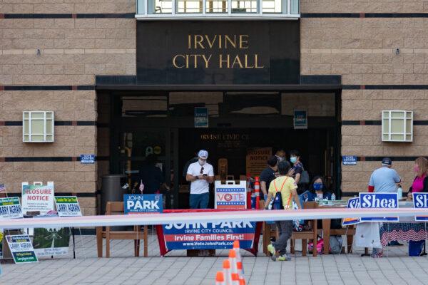 People cast their votes at a polling station at Irvine City Hall in Irvine, Calif., on Nov. 2, 2020. (John Fredricks/The Epoch Times)