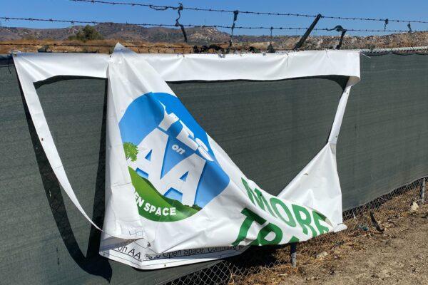 A sign in favor of Measure AA is vandalized in Orange, Calif., ahead of the Nov. 3, 2020 election. (Mark Moore)