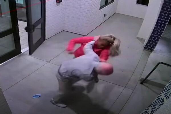 A screenshot taken from surveillance video shows a woman assaulting a veteran outside his apartment complex in Santa Ana, Calif., on Oct. 21, 2020. (Courtesy of the Santa Ana Police Department)