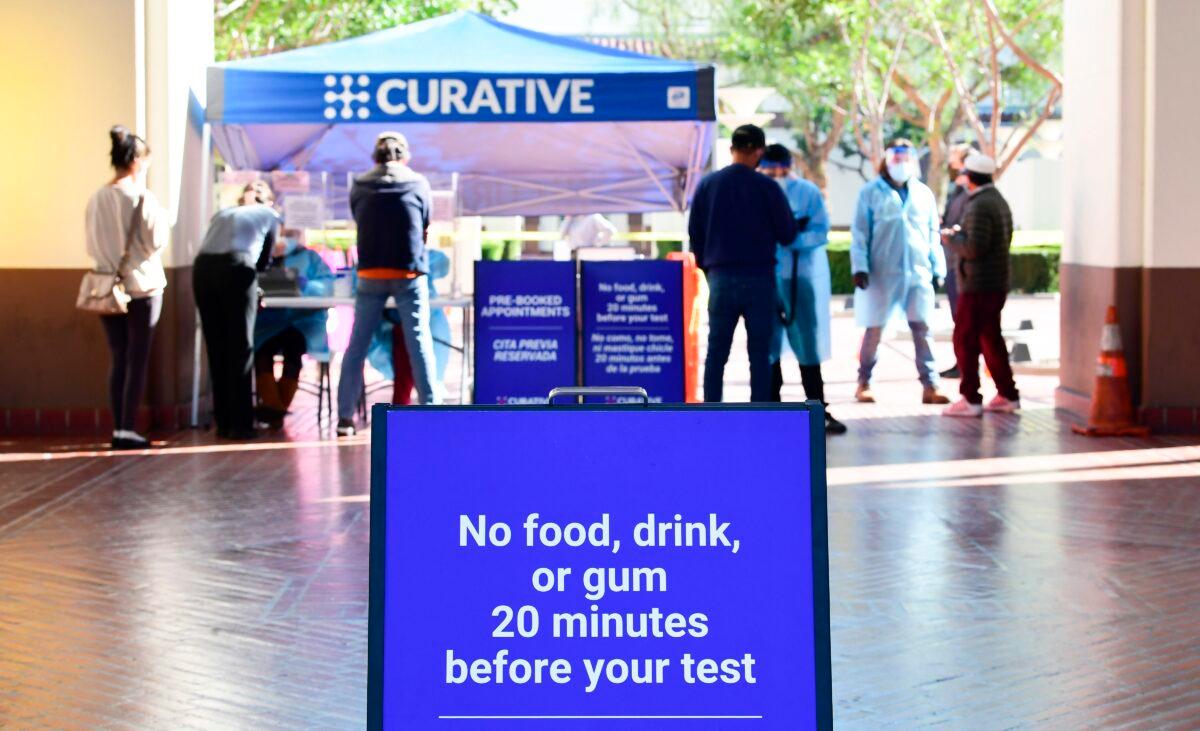People arrive for a COVID-19 test at Union Station in Los Angeles, Calif., on Nov. 13, 2020. (Frederic J. Brown/AFP via Getty Images)