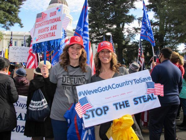 Rally attendees hold signs at California’s State Capitol in Sacramento on Nov. 14, 2020, to call for transparency in the elections. (Ilene Eng/The Epoch Times)