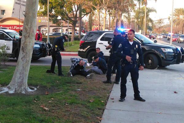 Santa Ana police used pepper spray to subdue three men who were engaged in a physical confrontation with protesters at a "Stop the Steal" rally in Santa Ana, Calif., on Dec. 6, 2020. (Courtesy of René Avila)