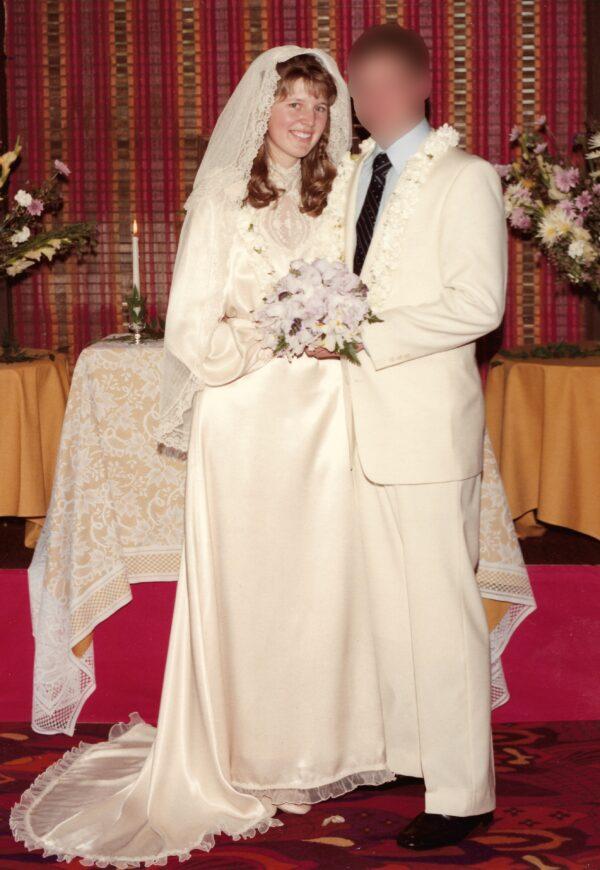 Elizabeth Sitton poses on her wedding day, at the age of 16, with the 28-year-old groom. (Courtesy of Elizabeth Sitton)