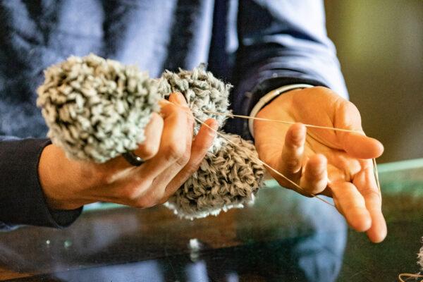 William Pugmire makes a teddy bear at his home in Carlsbad, Calif., on Dec. 29, 2020. (John Fredricks/The Epoch Times)