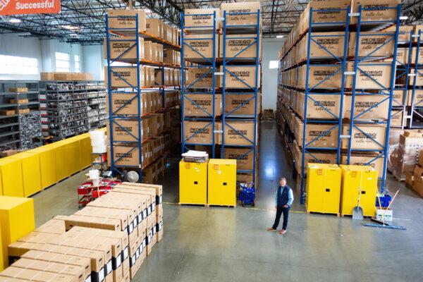 Don DiCostanzo stands in his stocked warehouse in Fountain Valley, Calif., on Jan. 14, 2021. (John Fredricks/The Epoch Times)