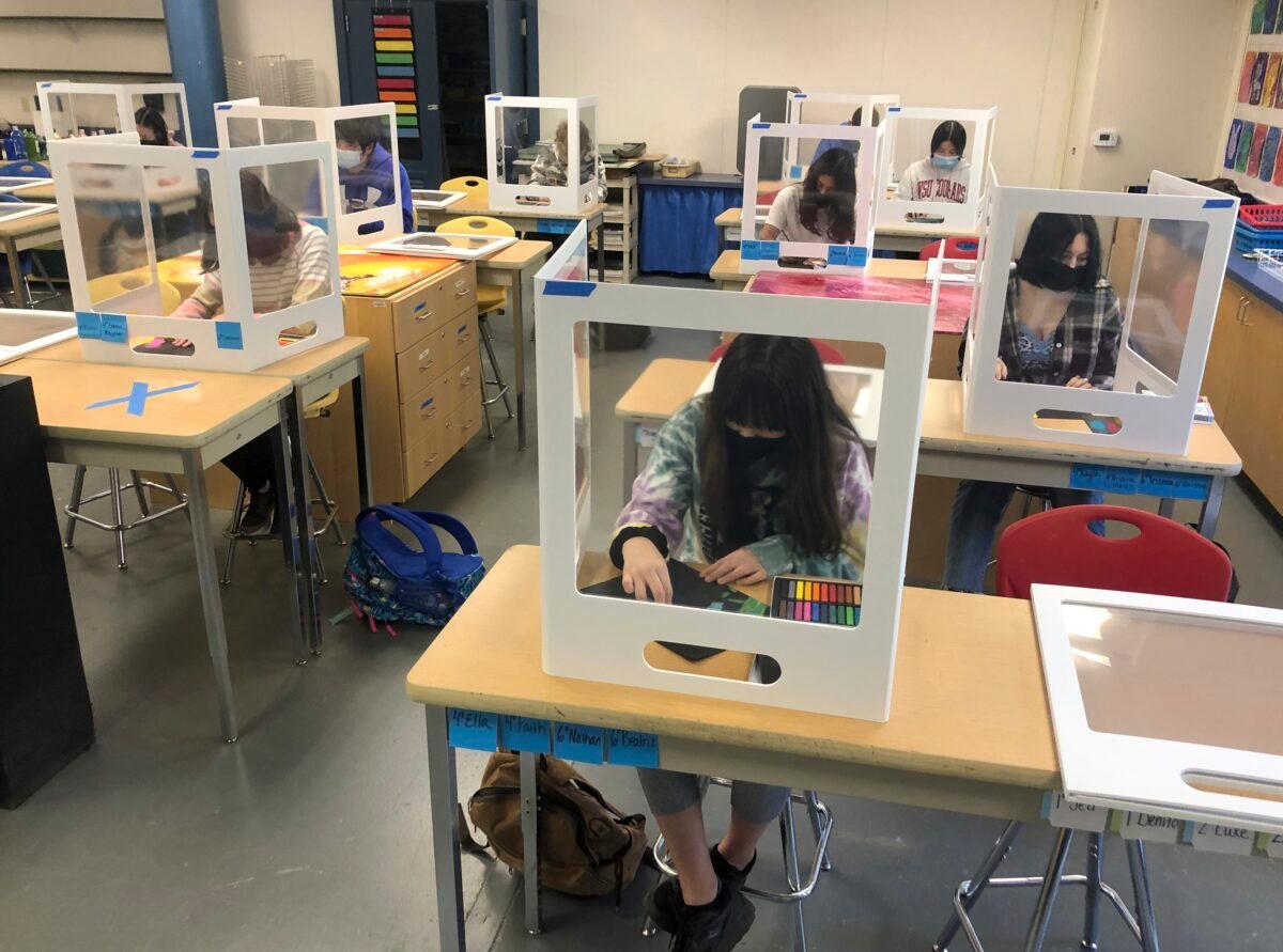 Students work on an art project during class at the Sinaloa Middle School in Novato, Calif., on March 2, 2021. (Haven Daley/AP Photo)