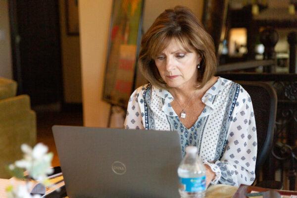 Susan Papiri works out of her home in La Habra Heights, Calif., on April 7, 2021. (John Fredricks/The Epoch Times)