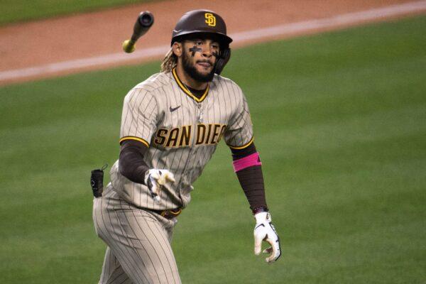 San Diego Padres' Fernando Tatis Jr. tosses his bat after hitting a solo home run during the sixth inning of the team's baseball game against the Los Angeles Dodgers in Los Angeles, Calif., on, April 24, 2021. (Kyusung Gong/AP Photo)