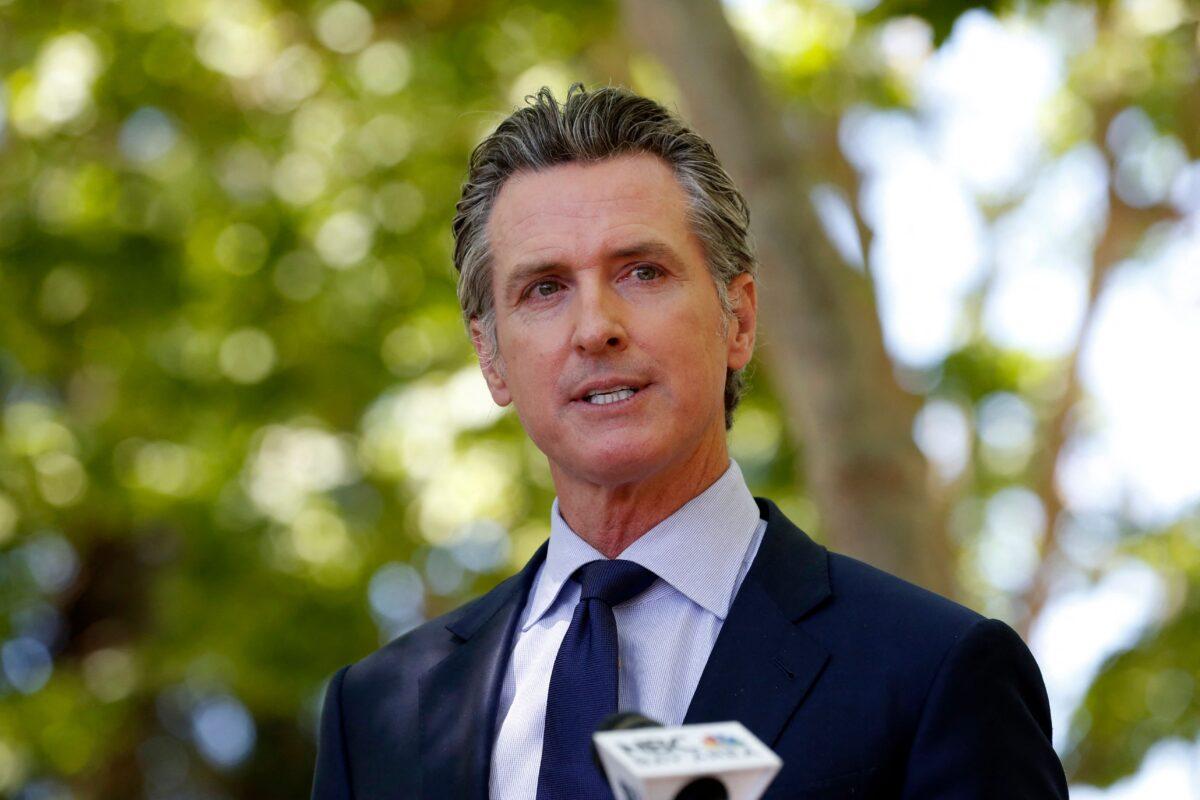California Gov. Gavin Newsom speaks during a news conference regarding the San Jose rail yard shooting in San Jose, Calif., on May 26, 2021. (Amy Osborne/AFP via Getty Images)