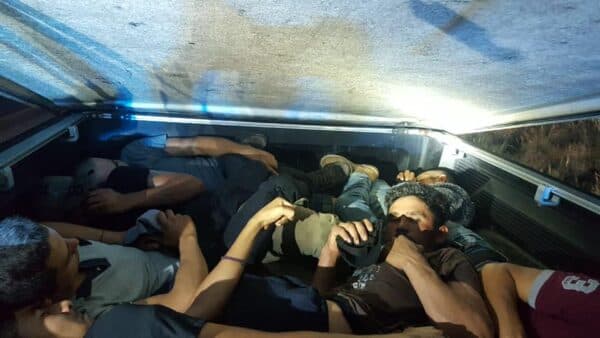 Illegal immigrants discovered in the bed of a pickup truck in Kinney County on June 14, 2021. (Kinney County Sheriff's Office)