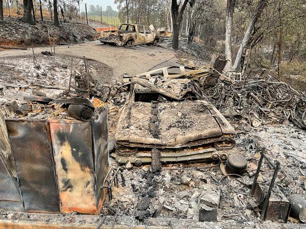 A classic Chevrolet El Camino that was lost along with the home of "Pete" Reyna Wednesday evening in Chicago Park, on Aug. 7, 2021. (Elias Funez/The Union via AP)