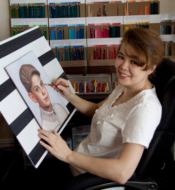 Alyona, an artist and landlord who hasn't received any pandemic help or rent since April 2020, draws a portrait. (Courtesy of Alyona Nickelsen)