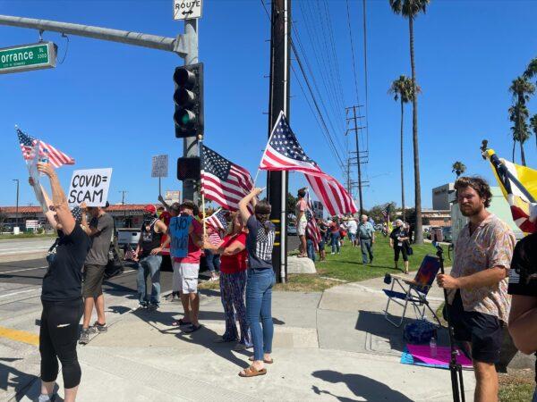 South Bay residents gather in front of City Hall to protest against mask and vaccine mandates in Torrance, Calif., on Sept. 11, 2021. (Alice Sun/The Epoch Times)