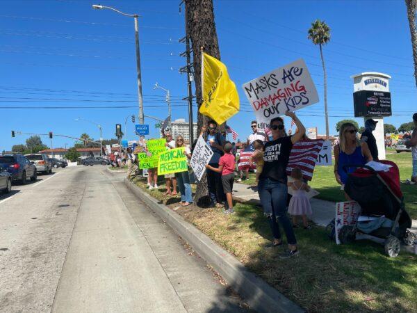 South Bay residents gather in front of City Hall to protest against mask and vaccine mandates in Torrance, Calif., on Sept. 11, 2021. (Alice Sun/The Epoch Times)