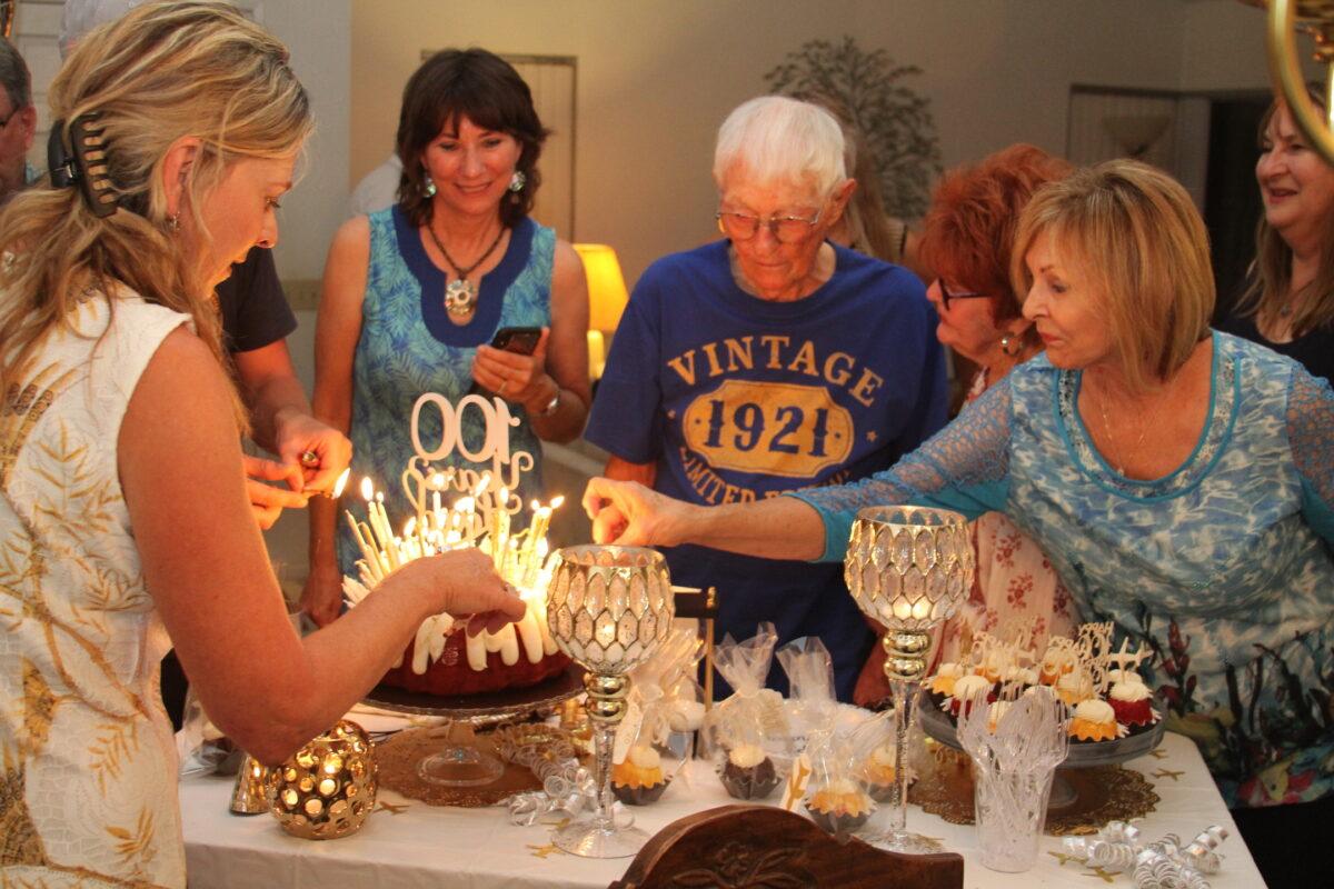 WWII veteran Ed Reeder and friends on his 100th birthday in Menifee, Calif., on Sept. 5, 2021. (Brad Jones/The Epoch Times)