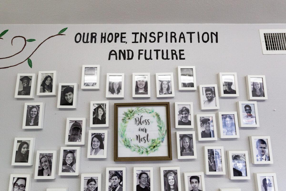 Photos of children who have transitioned out of the program hand at Robyne's Nest in Huntington Beach, Calif., on Aug. 24, 2021. (John Fredricks/The Epoch Times)
